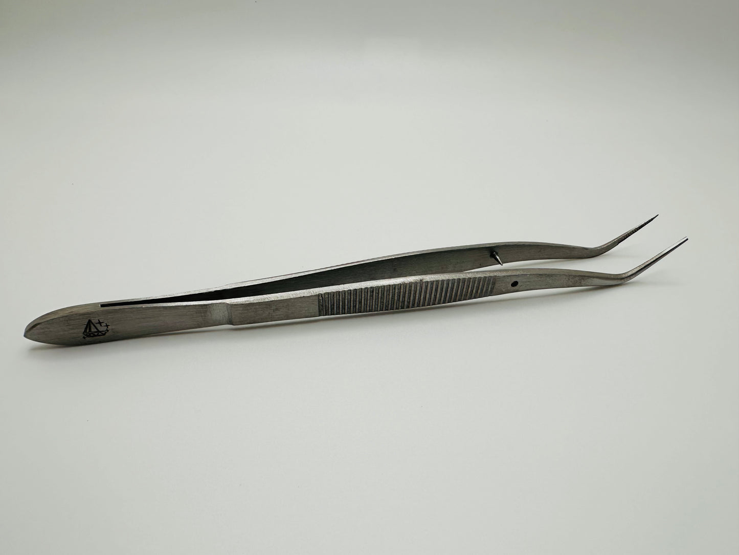 Dental Tweezer w/pin Double Bent.