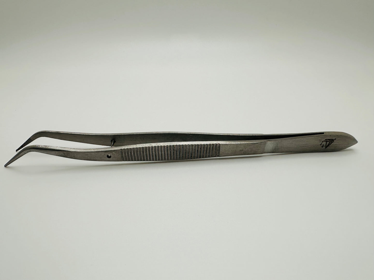 Dental Tweezer w/pin Double Bent.